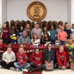 Classmates, and track team joins Megan at signing