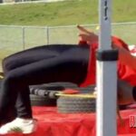 Seventh grader Madelen Jones is caught at practice over the high jump bar