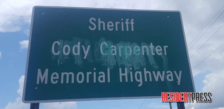 Cody Carpenter-Joel Campora-Memorial-Highway-Sign-Vandalized
