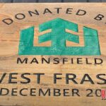 Heritage Funeral Home and Monuments donate plaque to memorialize town’s Christmas tree lighting.