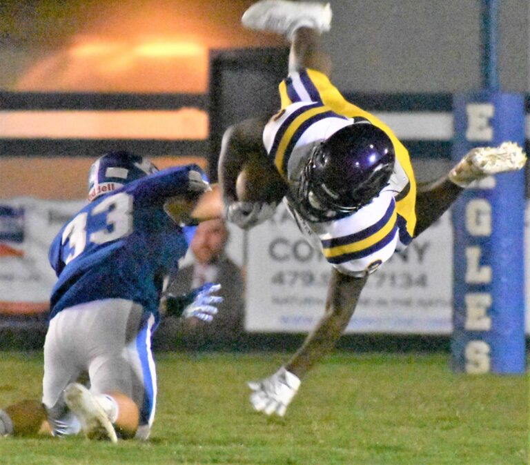 Paris Upends Mayflower to Win Conference Opener